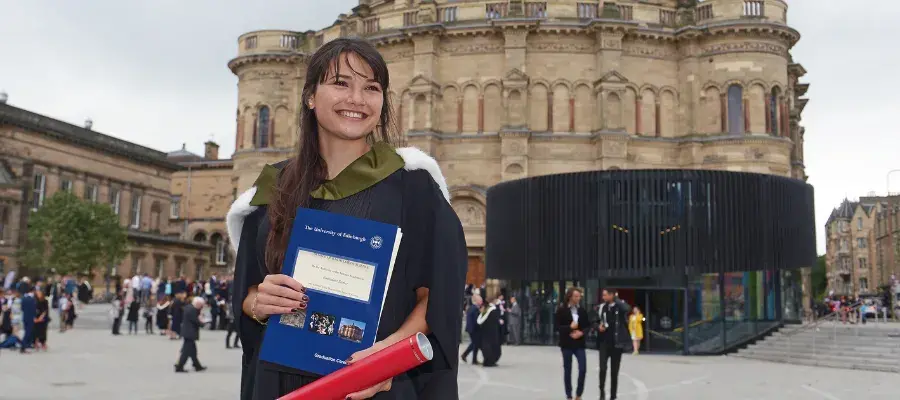 Woman graduate in Bristo Square