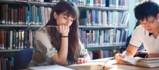 Woman studying in Psychology library