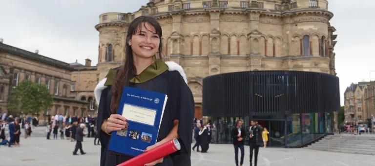 Woman graduate in Bristo Square