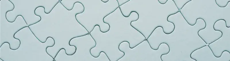 Image of a pale blue-green puzzle